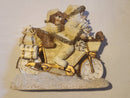 Santa and Teddy statue