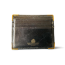 Launer, black leather six card holder with gold plated corners