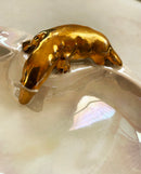 Small iridescent porcelain dish with gold plated platypus detail