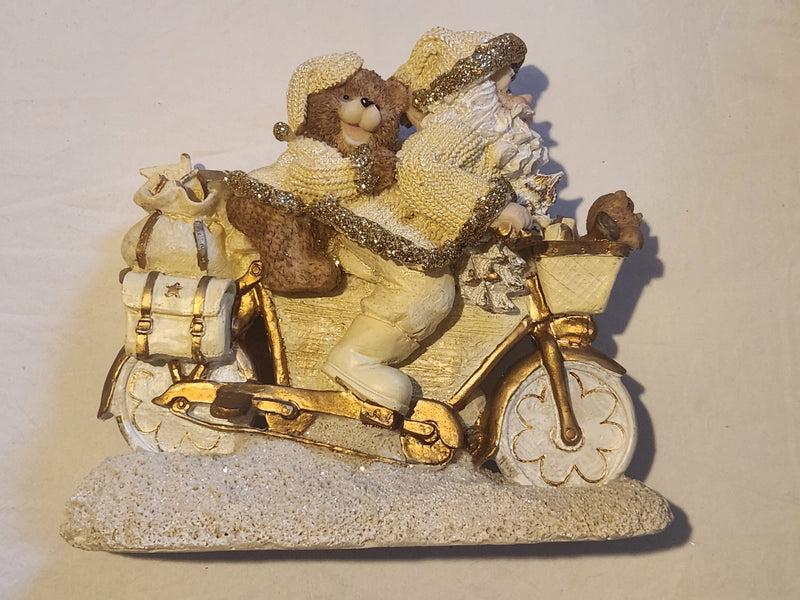 Santa and Teddy statue