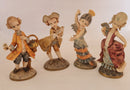 Group of 4 Vintage Depose Figurines