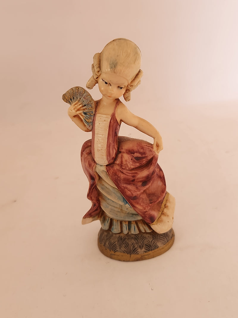 Group of 4 Vintage Depose Figurines