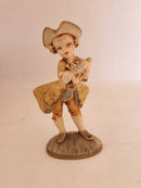 Group of 4 Vintage Depose Figurines