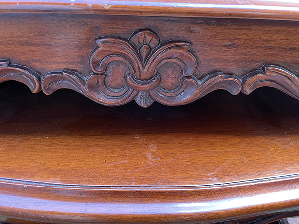 Wooden surface with intricate carvings