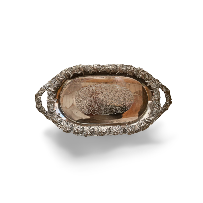 Ornate oval silver-plated tray with cherub, grape and vine design