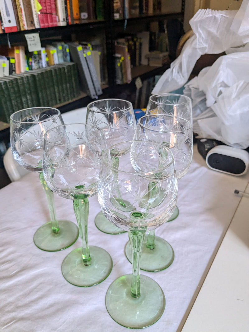 vintage tall wine glass with green stem and foot