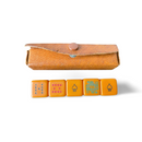 Vintage bakelite butterscotch poker dice set with leather case